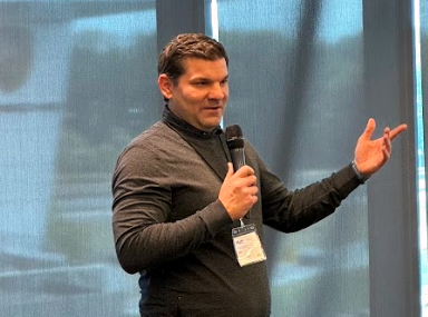 Matt speaking at a sales kickoff meeting